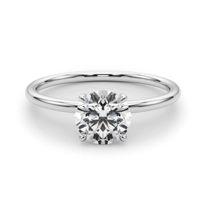 Newcastle Basket Solitaire Engagement Ring in Round White Gold